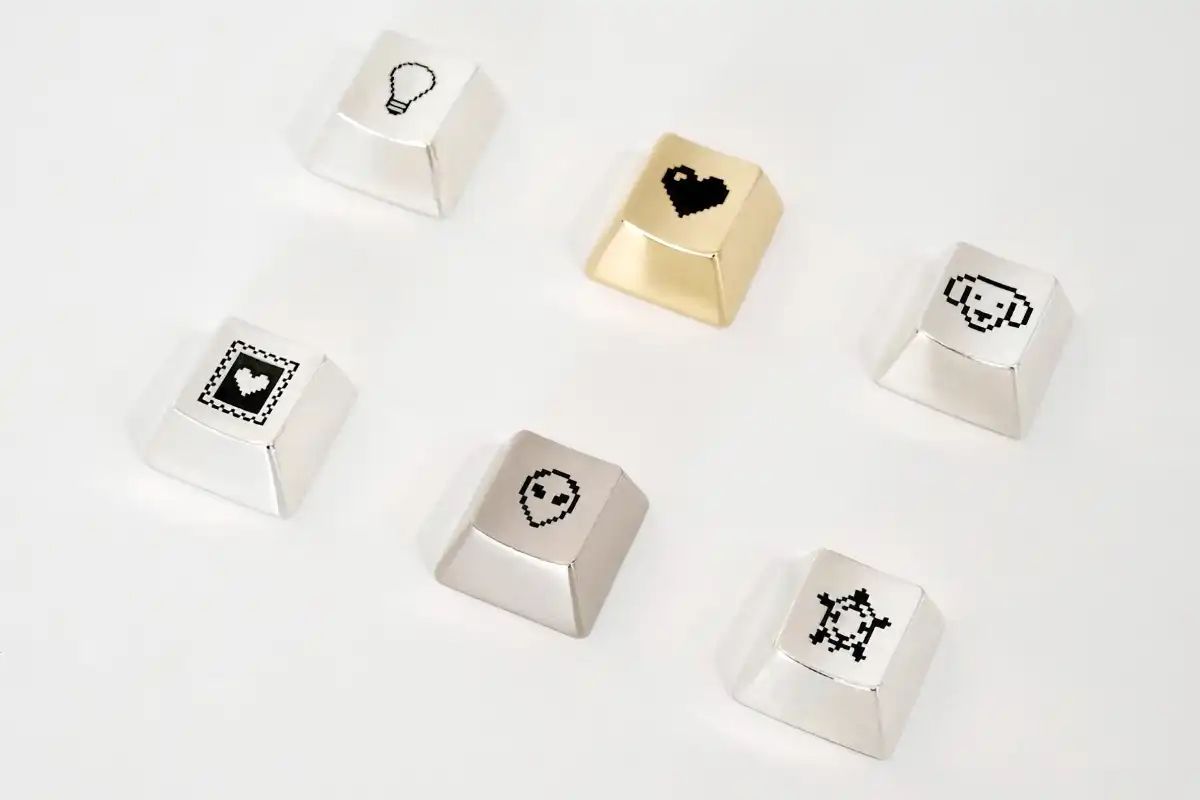 初代苹果 Macintosh 图标设计师推出限量像素艺术键帽和吊坠，价格不菲